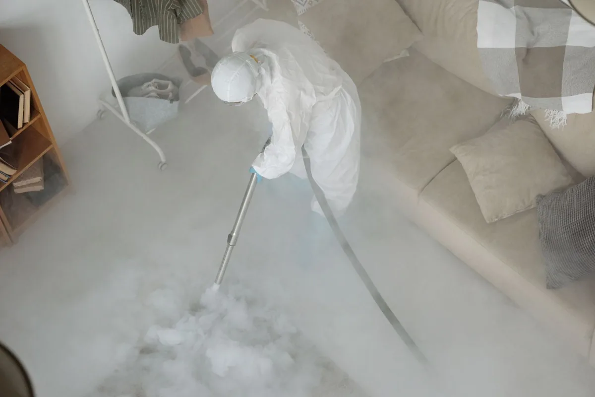 Biohazard cleanup technician in protective equipment, South Fairmount, Cincinnati, OH